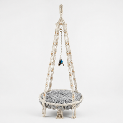 Hanging macrame cat bed with furry cushion